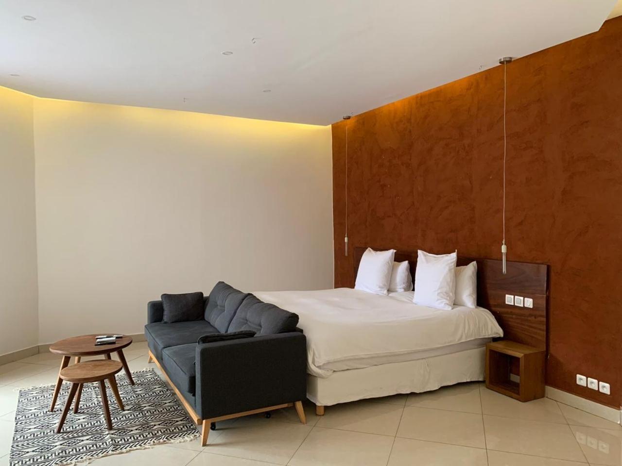Le Patio Hotel Lome Bagian luar foto